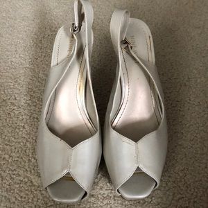 Nude pump with open toe